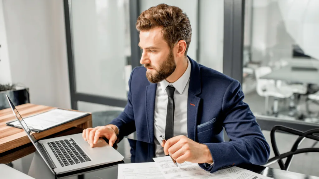 Remote employees checking out a contract for clarification on tax obligations