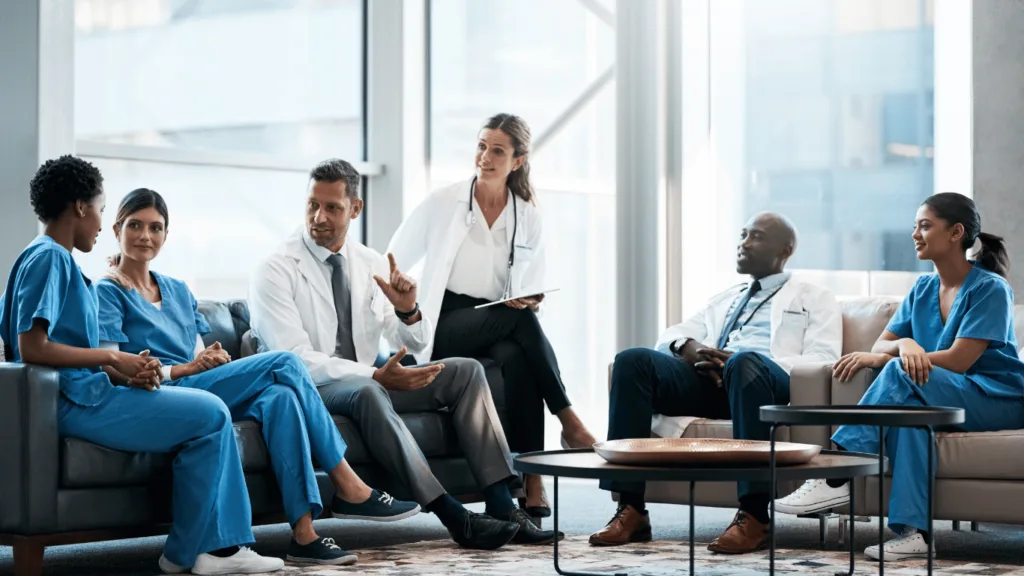 Healthcare organizations discussing outsourcing healthcare compliance